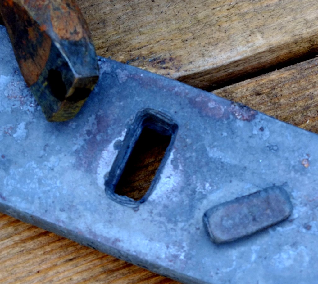 Hot-punched mortice ready for the top cross rail.