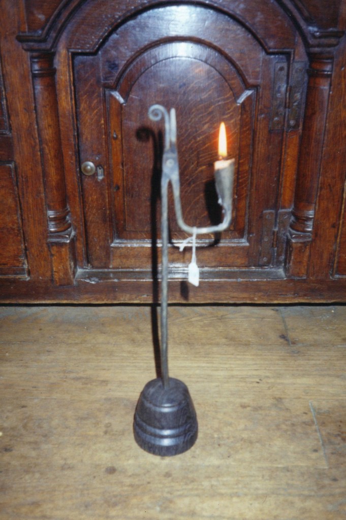Rushlight candle holder.
