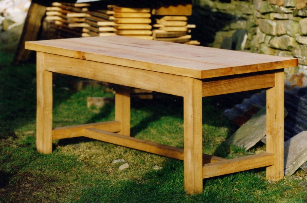 Farmhouse kitchen table in oak and sycamore.